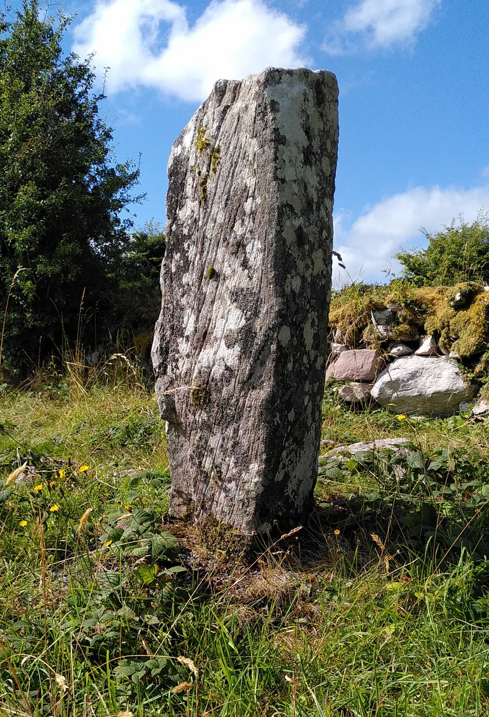 Rusheens West Ogham stone beside the holy well, Co. Mayo