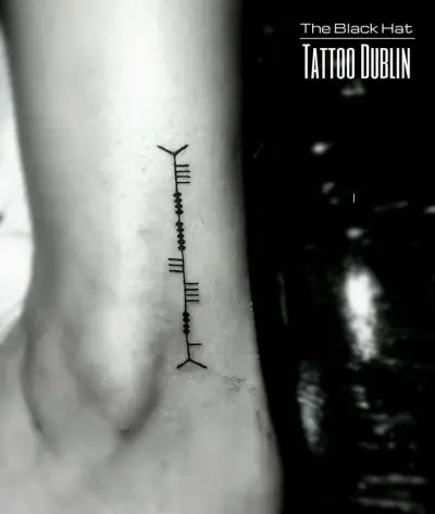 Ogham tattoo —  on ankle